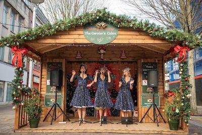 Swansea Market Christmas - Caroler's Cabin trio.