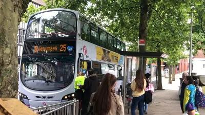 Passengers getting on bus at Castle Square