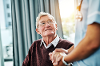 Man looking up at carer