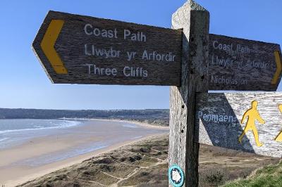 Oxwich Bay with signpost.